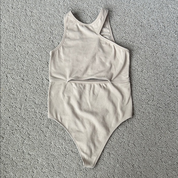 Colsie Tops - Colsie Ribbed Bodysuit Asymmetrical Cutout Natural Thong Shapewear Layer M NWOT